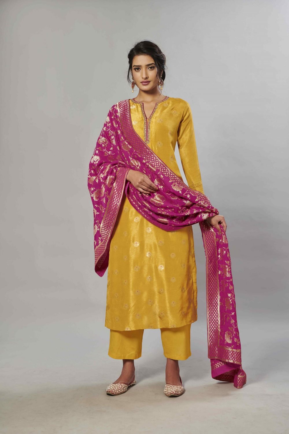 A Pure Spun Silk Mustard Orange Kurta With Sharara & Georgette Dupatta.